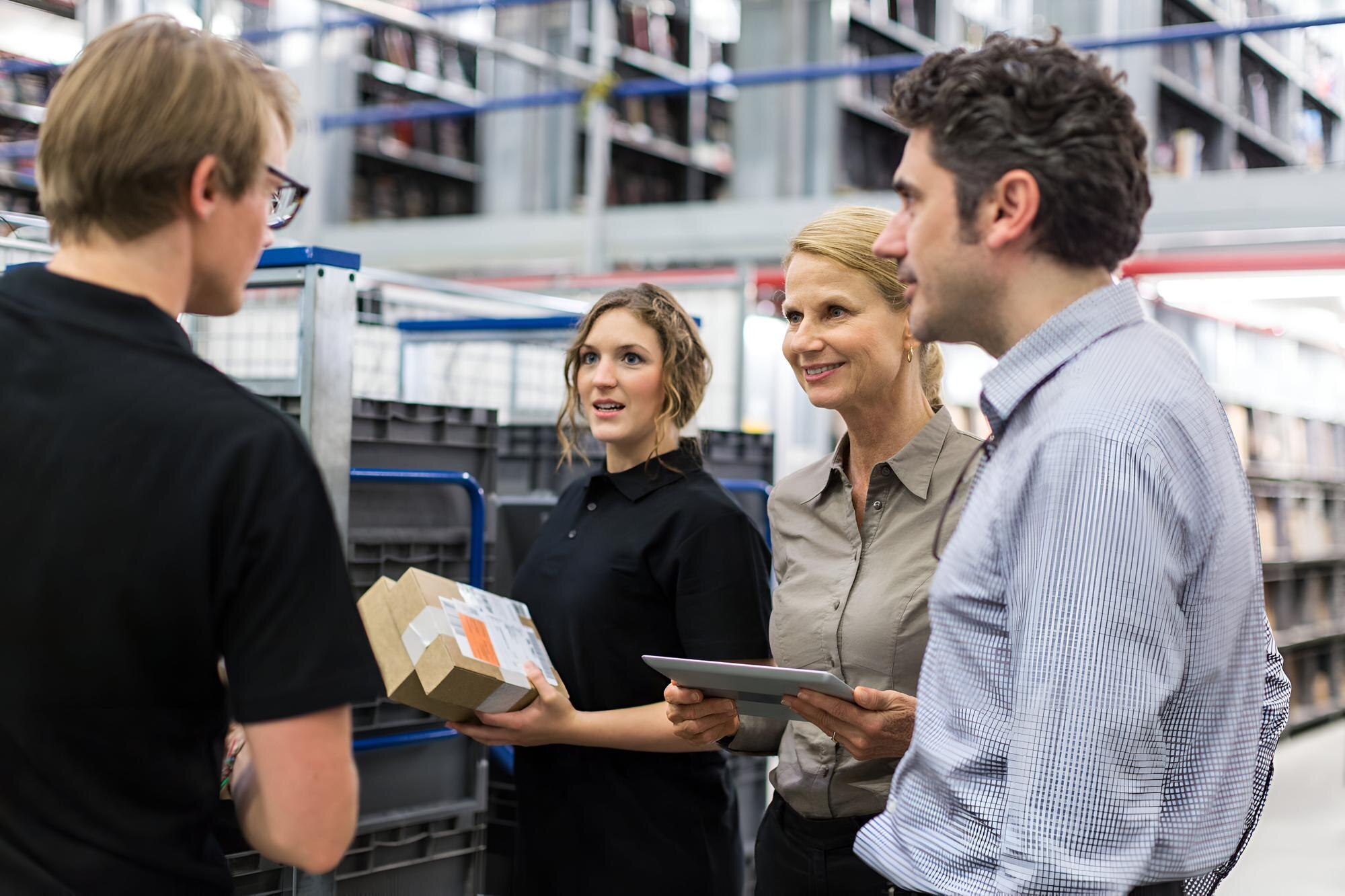 logistics-team-discussing-delivery-schedules-stock-774935-3969.jpg